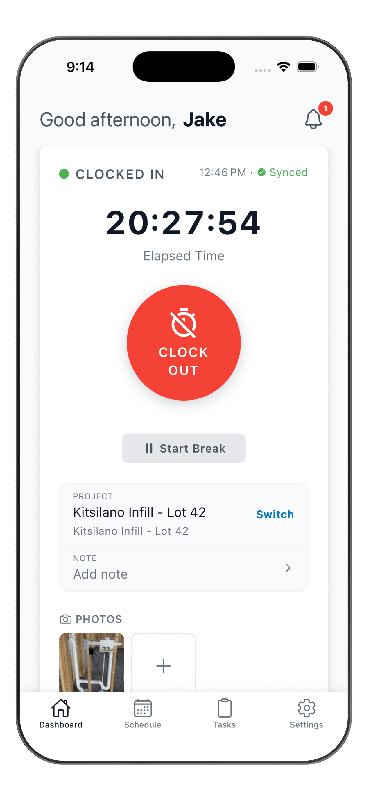 WorkxPro mobile app clocked-in screen showing a running elapsed timer, a red Clock Out button, Start Break, the active project Kitsilano Infill Lot 42, a note field, an attached job photo, and a Synced status